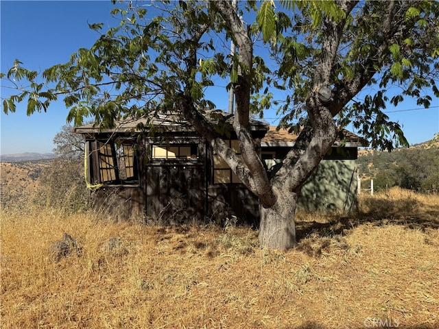 exterior space featuring a mountain view