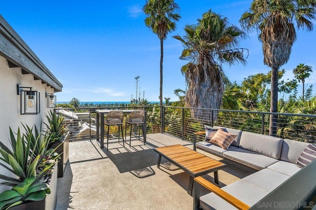 view of patio / terrace featuring a balcony and outdoor lounge area