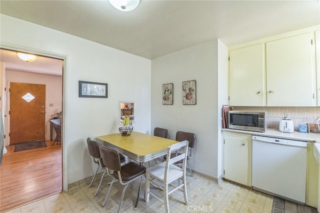 dining room featuring light hardwood / wood-style flooring