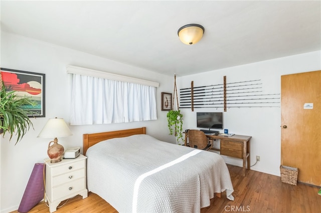 bedroom featuring light hardwood / wood-style floors