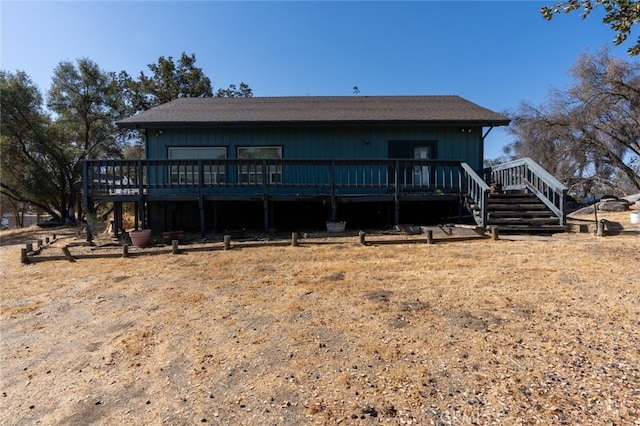 rear view of house with a deck