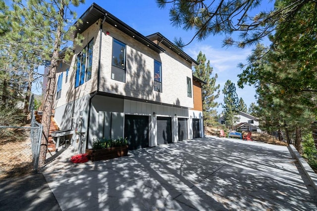 view of home's exterior with a garage