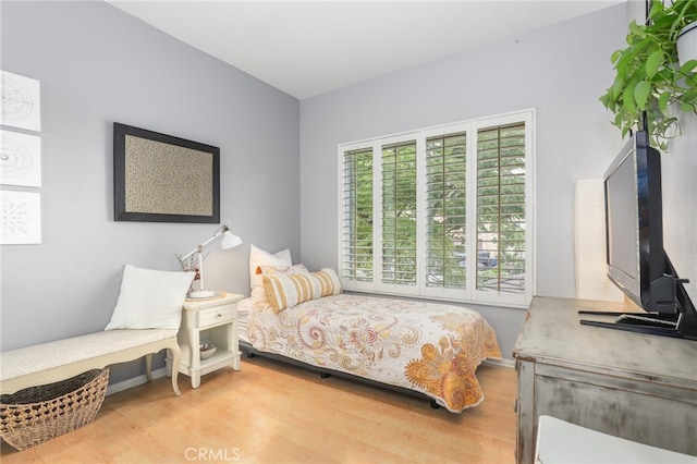 bedroom featuring hardwood / wood-style flooring