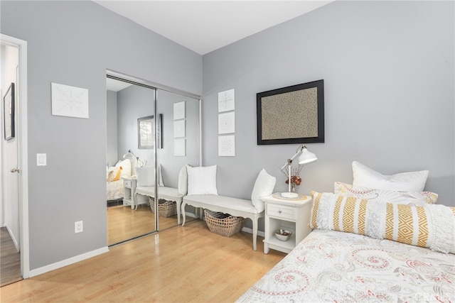 bedroom featuring a closet and hardwood / wood-style flooring