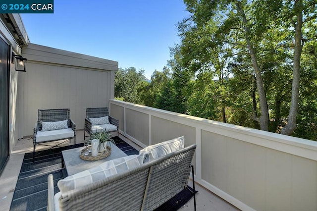 balcony featuring outdoor lounge area