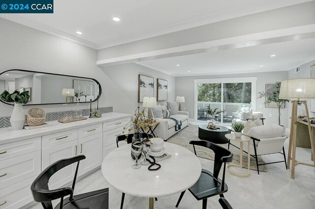 dining area featuring ornamental molding