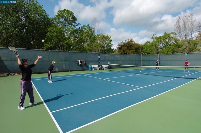 view of tennis court with basketball court