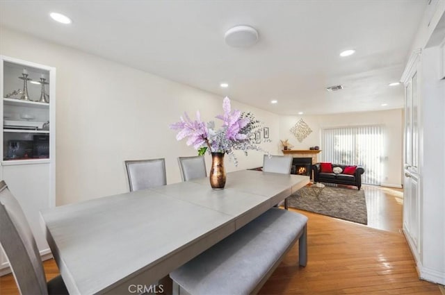 dining room featuring light hardwood / wood-style flooring