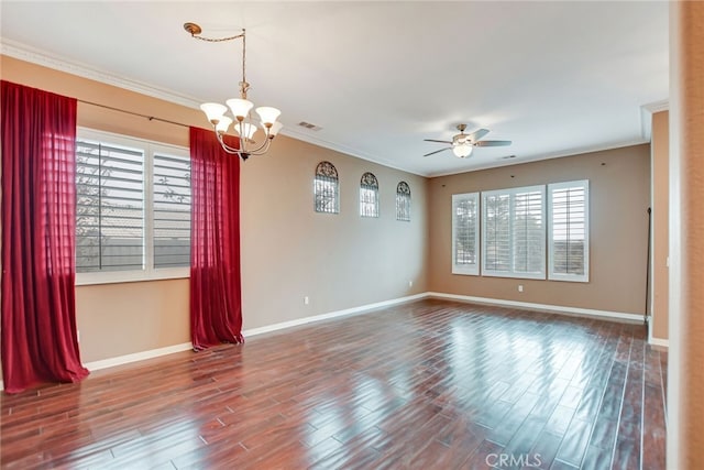 empty room featuring ornamental molding, ceiling fan with notable chandelier, and hardwood / wood-style floors