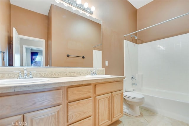 full bathroom with toilet, tile patterned flooring, vanity, and shower / bathtub combination