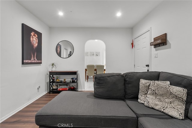 living room with dark wood-type flooring