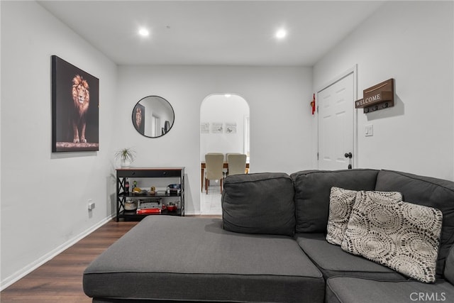 living room with dark hardwood / wood-style floors