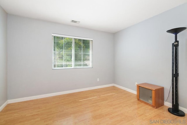 empty room with light wood-type flooring