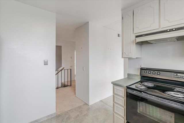 kitchen with white cabinetry and black range with electric stovetop