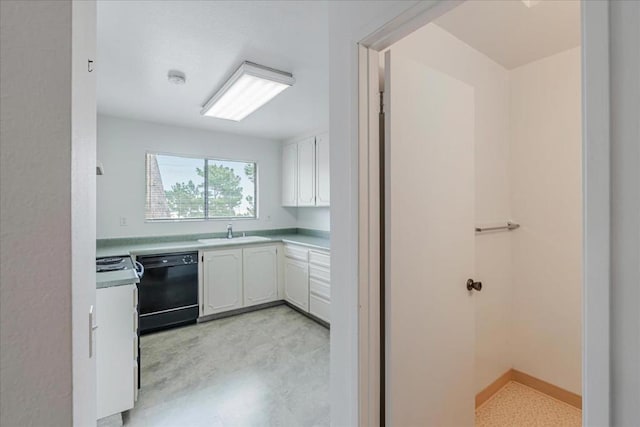 kitchen with sink, white cabinets, and black dishwasher