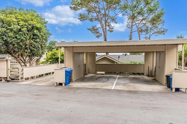 view of car parking featuring a carport