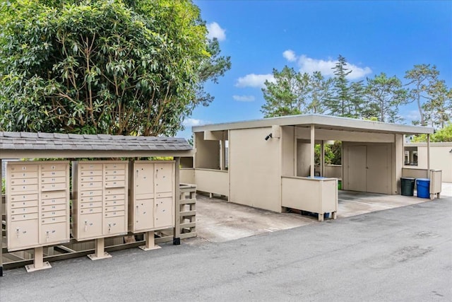 view of property's community with mail boxes