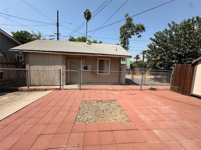 back of property featuring a patio