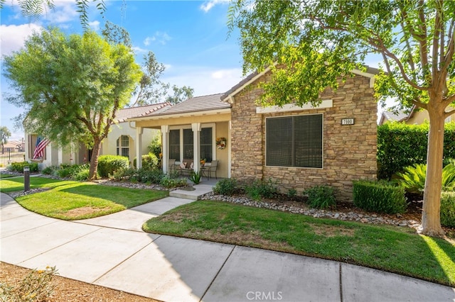 view of front of home with a front yard