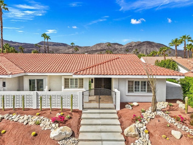 view of front of property with a mountain view