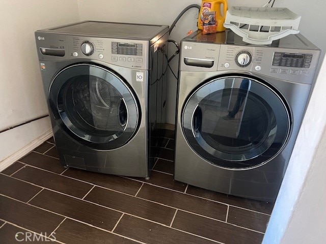 laundry room featuring washer and dryer