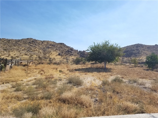 view of mountain feature with a rural view