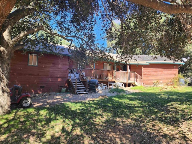 view of yard with a wooden deck