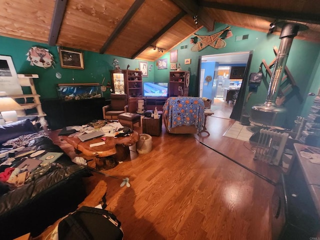 interior space featuring wooden ceiling, vaulted ceiling with beams, and hardwood / wood-style floors