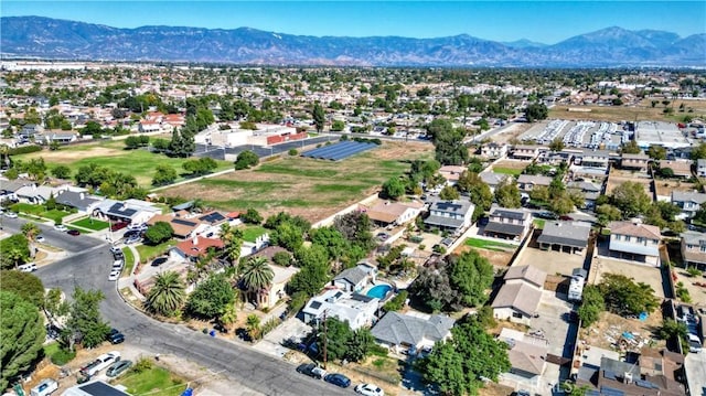 drone / aerial view featuring a mountain view