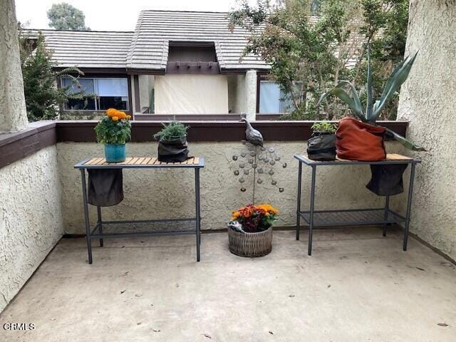 view of patio / terrace featuring a balcony