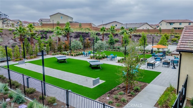 view of community featuring a lawn