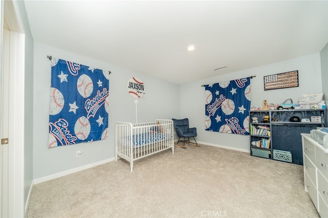 bedroom featuring light carpet