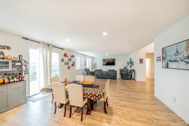 dining room with light hardwood / wood-style floors