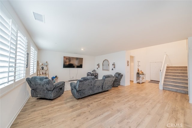 living room featuring light wood-type flooring