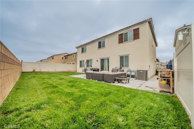 rear view of house with an outdoor hangout area, a yard, central air condition unit, and a patio area