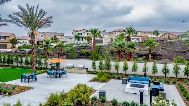 exterior space with an outdoor fire pit