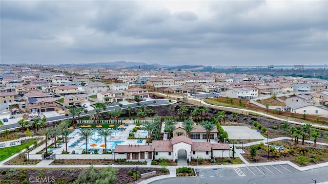 birds eye view of property featuring a mountain view