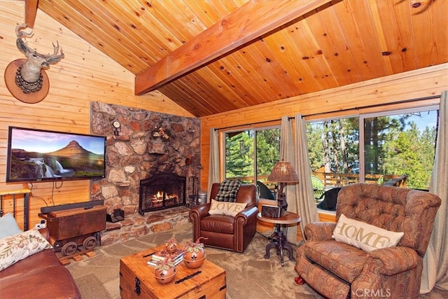 carpeted living room featuring a stone fireplace, wood ceiling, wood walls, and lofted ceiling with beams