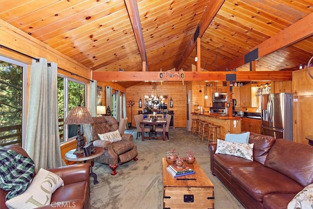 carpeted living room featuring wood ceiling, wood walls, beamed ceiling, and a chandelier