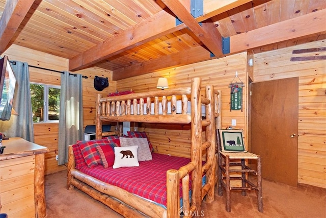 bedroom featuring wood walls, carpet, beamed ceiling, and wooden ceiling