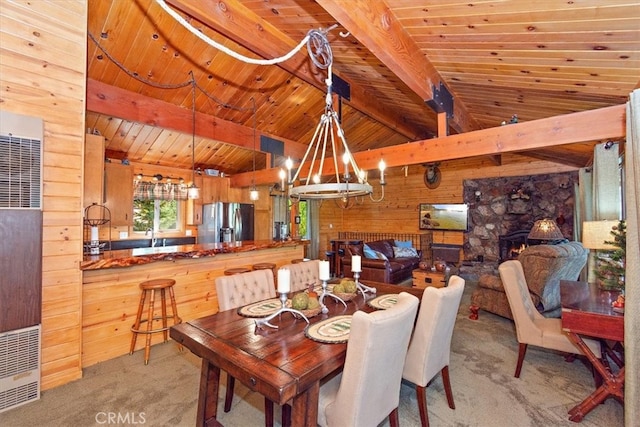 dining space with wood ceiling, wood walls, lofted ceiling with beams, and light colored carpet