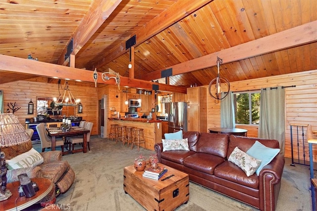 living room featuring vaulted ceiling with beams, light carpet, wooden ceiling, wooden walls, and a chandelier