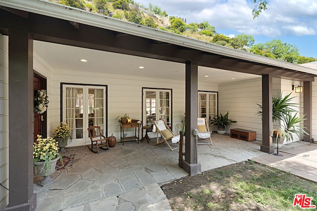 view of patio featuring french doors