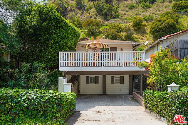 view of front of property with a deck