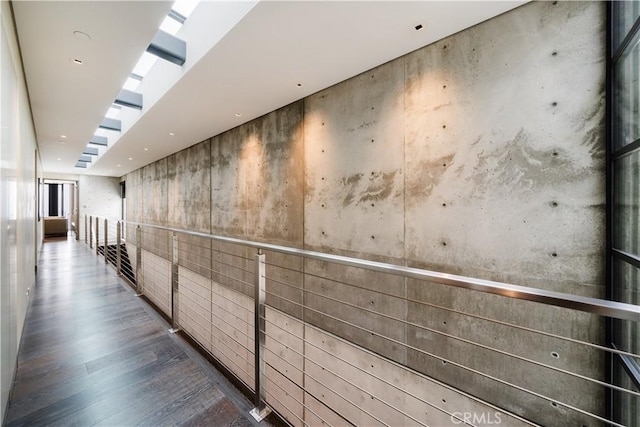 corridor featuring dark wood-type flooring