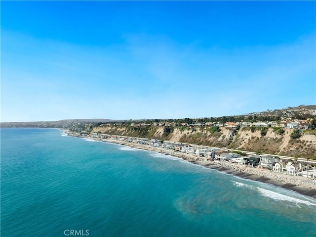 bird's eye view with a view of the beach and a water view