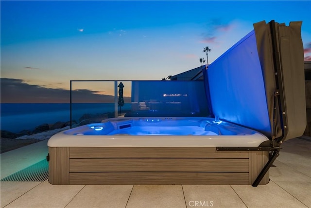 exterior space featuring a hot tub