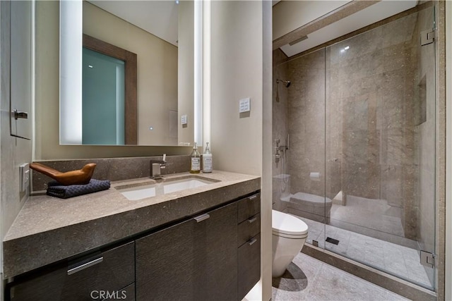 bathroom featuring vanity, toilet, and walk in shower