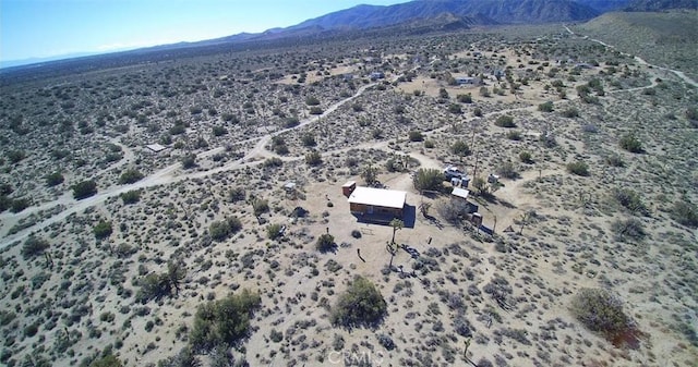 bird's eye view with a mountain view