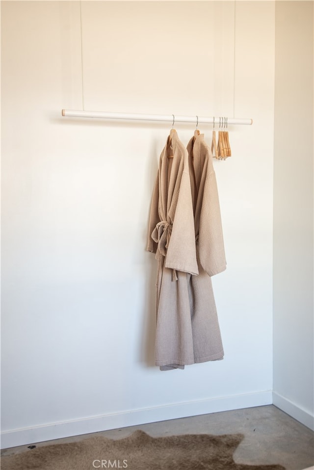 mudroom featuring concrete floors